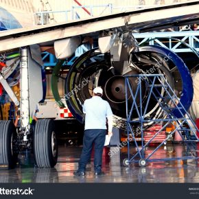 stock-photo-engine-and-chassis-of-the-passenger-airplane-under-heavy-maintenance-engineer-checks-the-aircraft-462065305 stock-photo-engine-and-chassis-of-the-passenger-airplane-under-heavy-maintenance-engineer-checks-the-aircraft-462065305